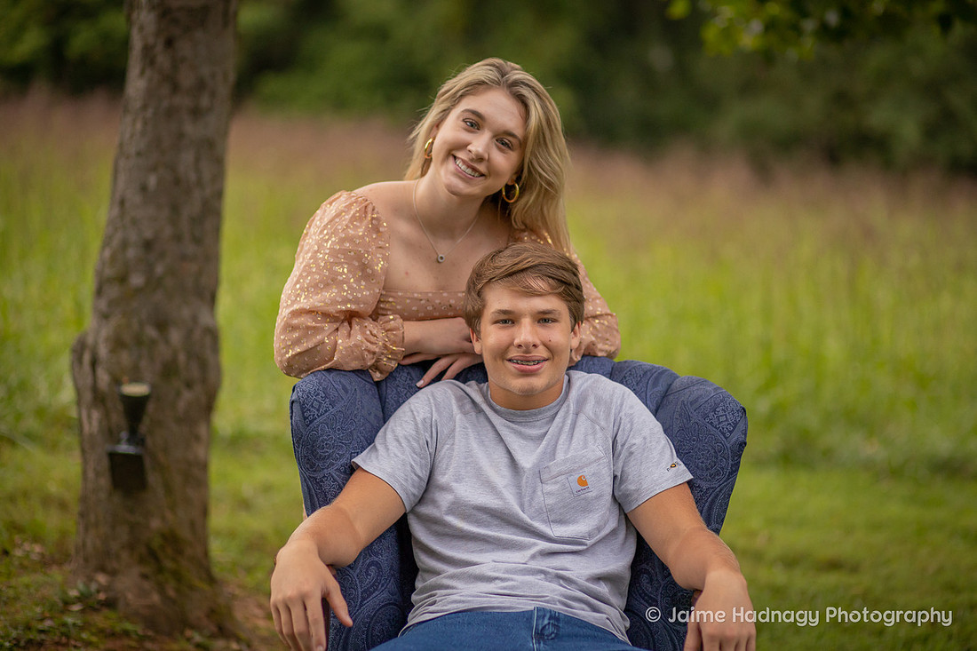 Asheville Family Photographer Portraits with dog in a chair outdoors