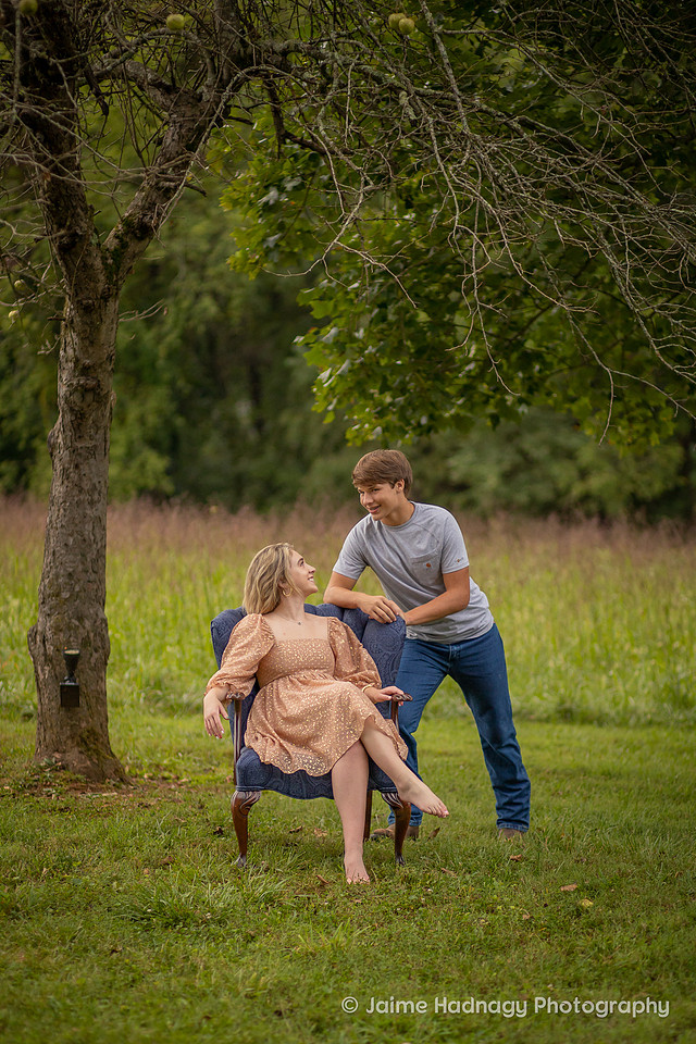 Asheville Family Photographer Portraits with dog in a chair outdoors