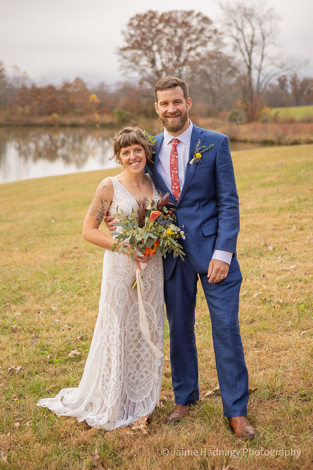 Fun Wedding Portraits of Bride and Groom Outdoors by a Lake | Asheville Photographer