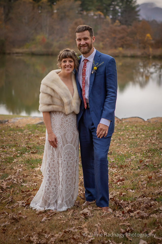 Fun Wedding Portraits of Bride and Groom Outdoors by a Lake | Asheville Photographer