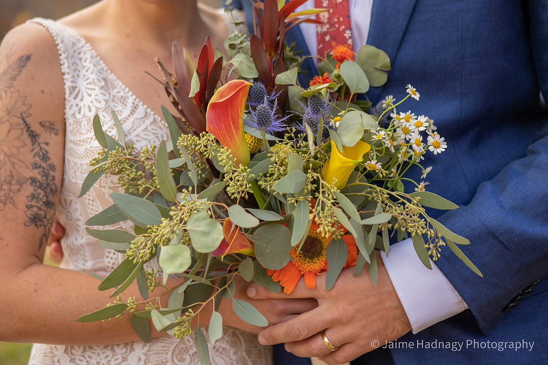 Fun Wedding Portraits of Bride and Groom Outdoors by a Lake | Asheville Photographer