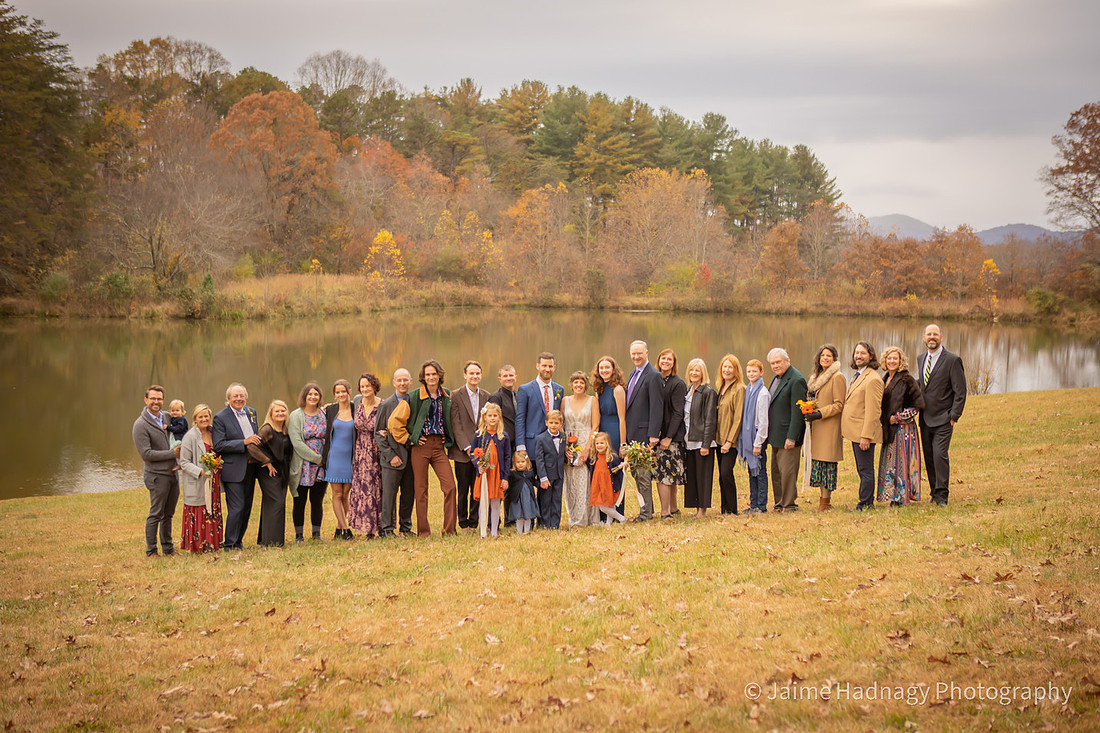 Fun Wedding Portraits of Bride and Groom Outdoors by a Lake | Asheville Photographer