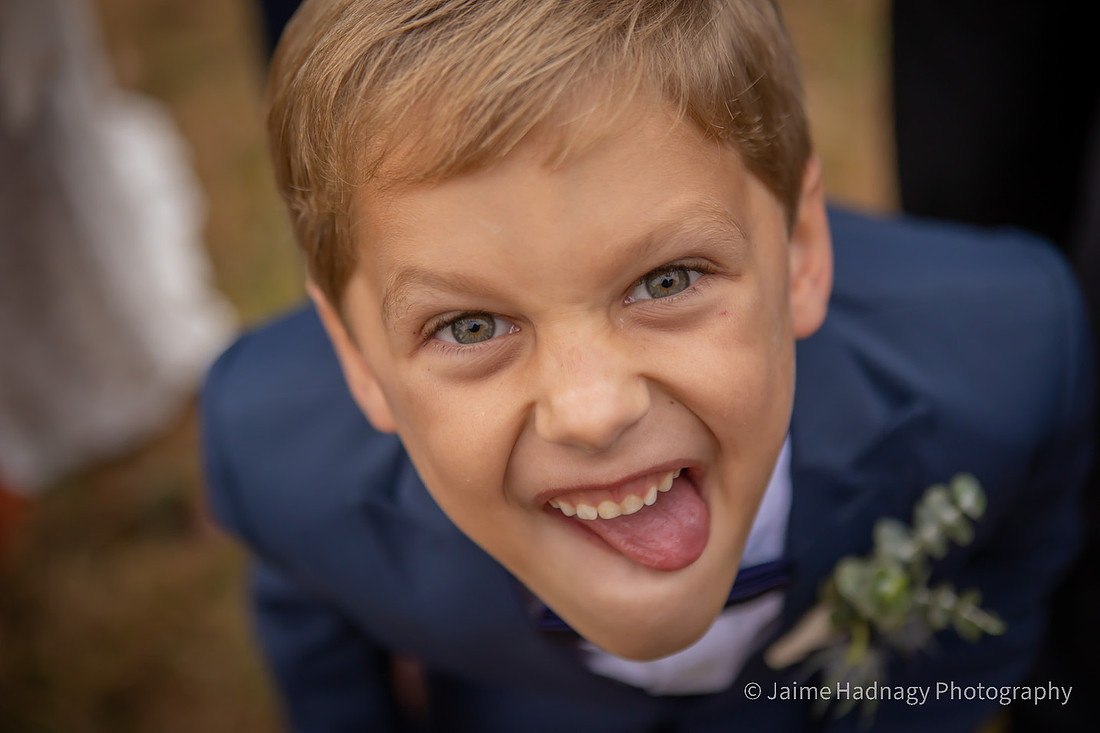 Fun Wedding Portraits of Bride and Groom Outdoors by a Lake | Asheville Photographer
