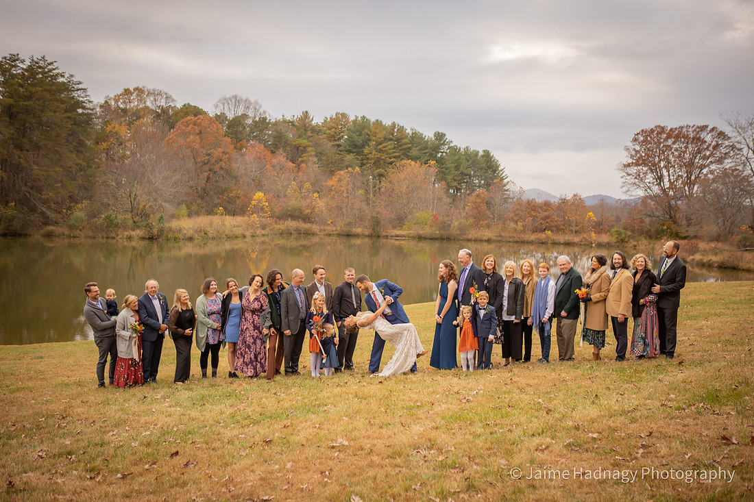 Fun Wedding Portraits of Bride and Groom Outdoors by a Lake | Asheville Photographer