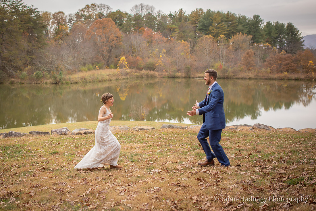 Fun Wedding Portraits of Bride and Groom Outdoors by a Lake | Asheville Photographer
