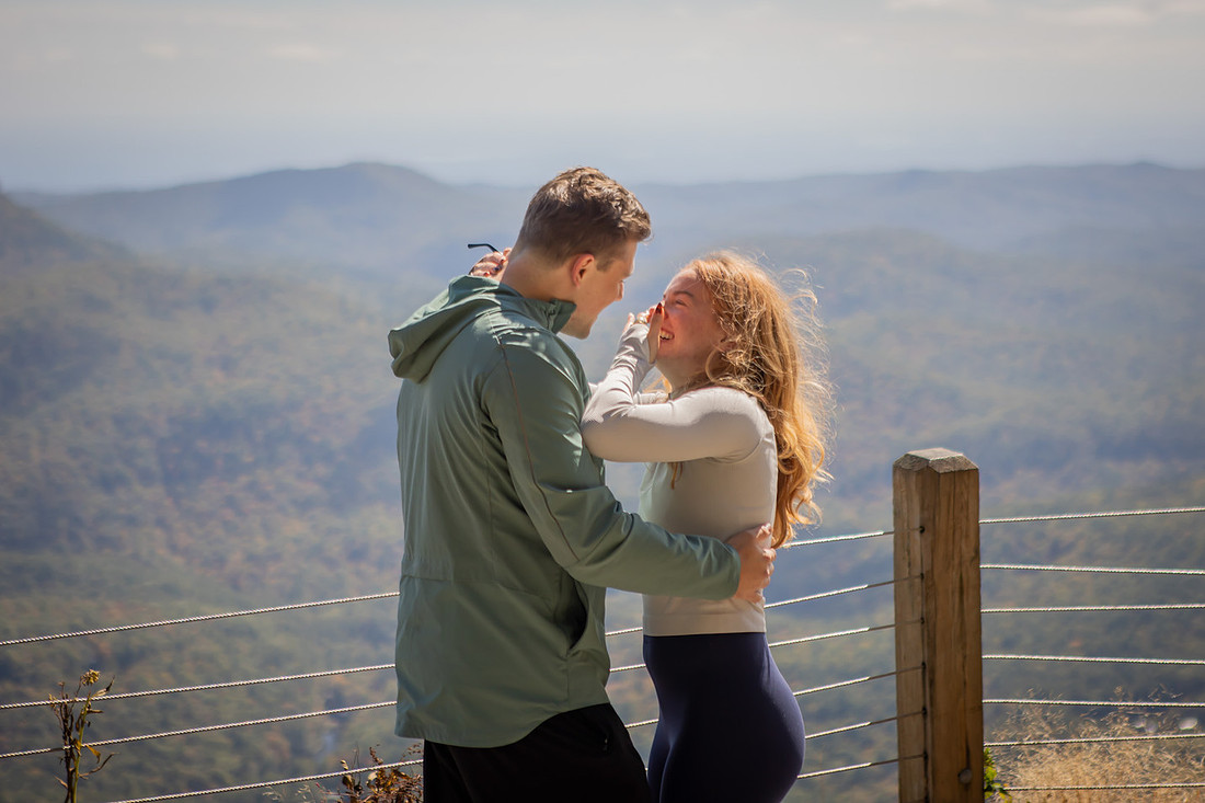 Surprise Engagement Photography at Whiteside Mountain in High;ands NC 