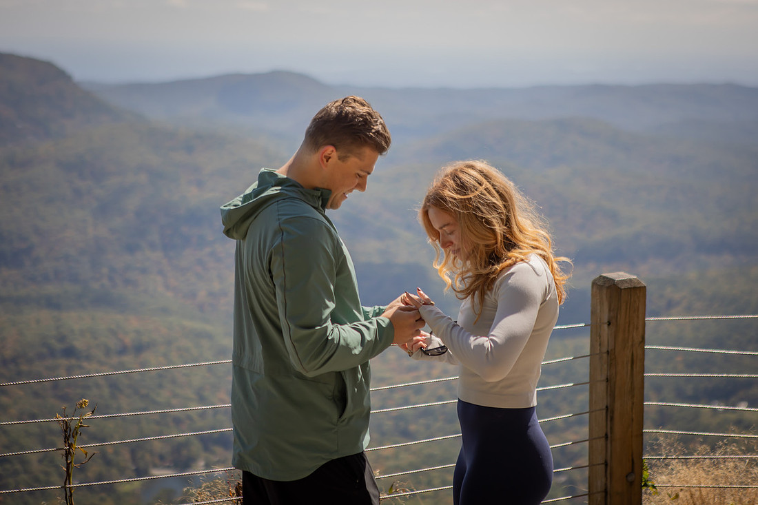 Surprise Engagement Photography at Whiteside Mountain in High;ands NC 