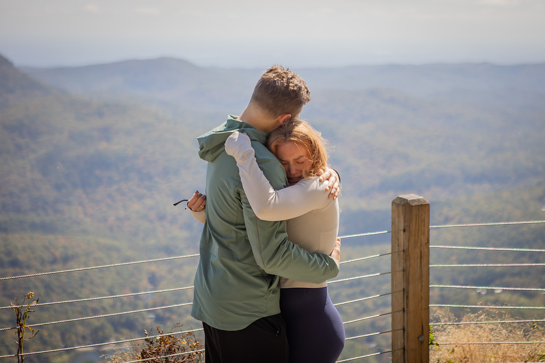 Surprise Engagement Photography at Whiteside Mountain in High;ands NC 