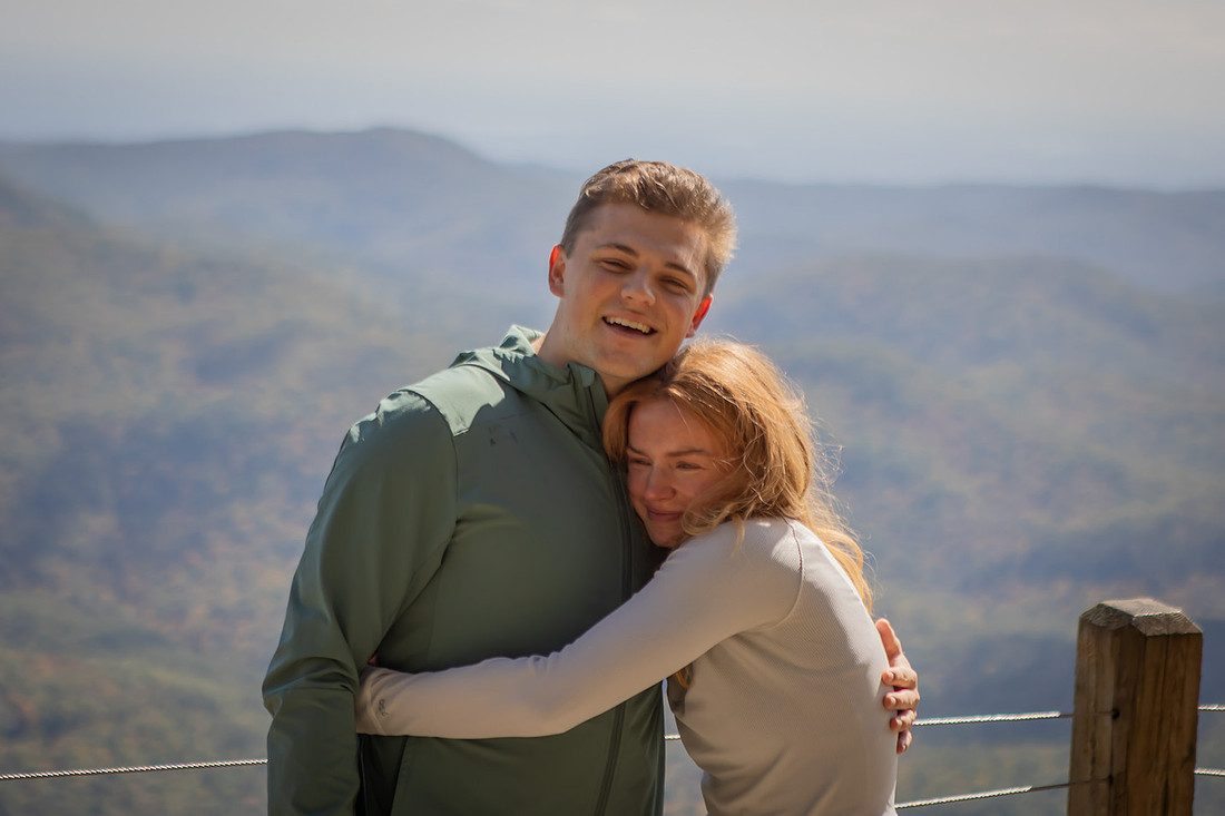 Surprise Engagement Photography at Whiteside Mountain in High;ands NC 