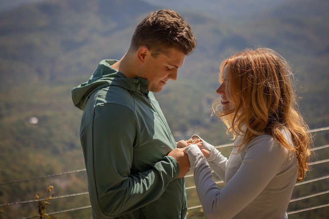 Surprise Engagement Photography at Whiteside Mountain in High;ands NC 