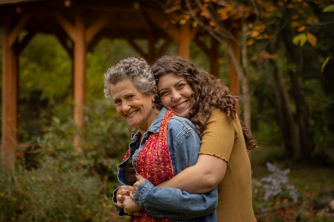 Fun Family Photos with Adult Children in Asheville Botanical Gardens