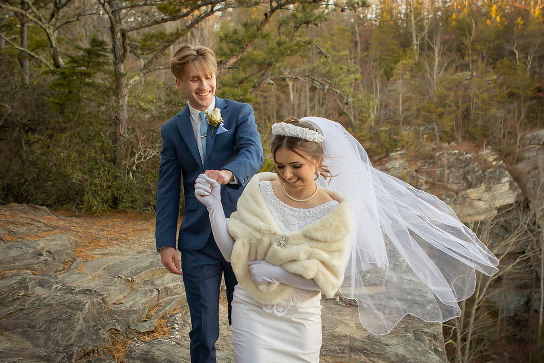 Bride and Groom Adventure Wedding Walking along Cliffs