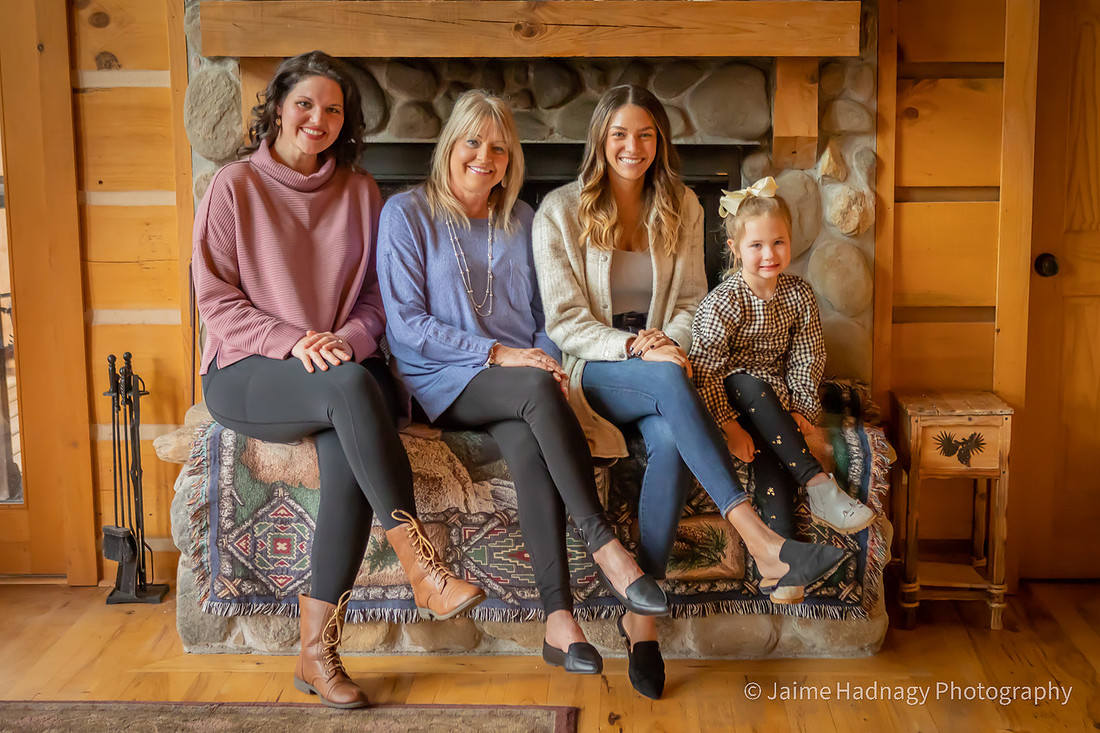 Family photos at cabin with sleeping boy | Black Mountain Photographer