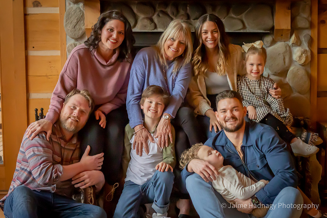 Family photos at cabin with sleeping boy | Black Mountain Photographer