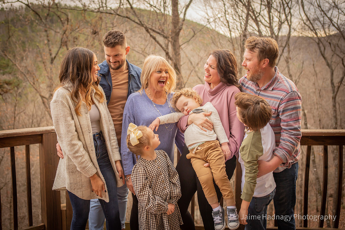Family photos at cabin with sleeping boy | Black Mountain Photographer