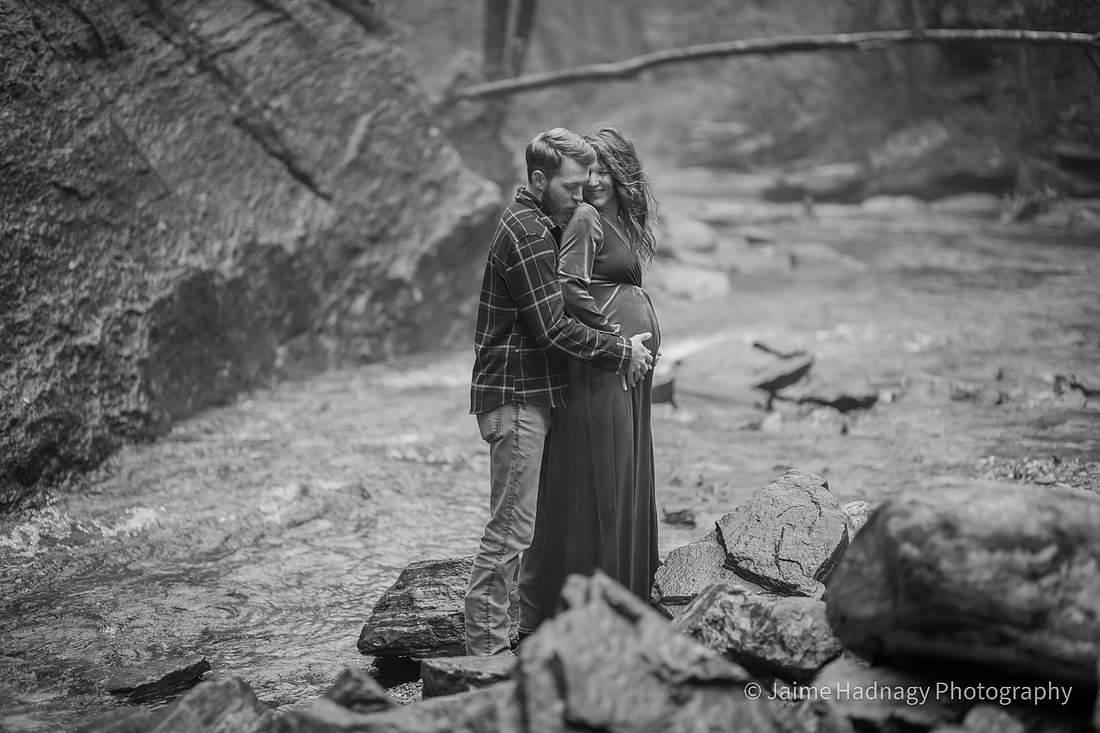 Gorgeous Pregnant Woman at a Waterfall with Umbrella and Red Velvet Dress | North Carolina Photographer