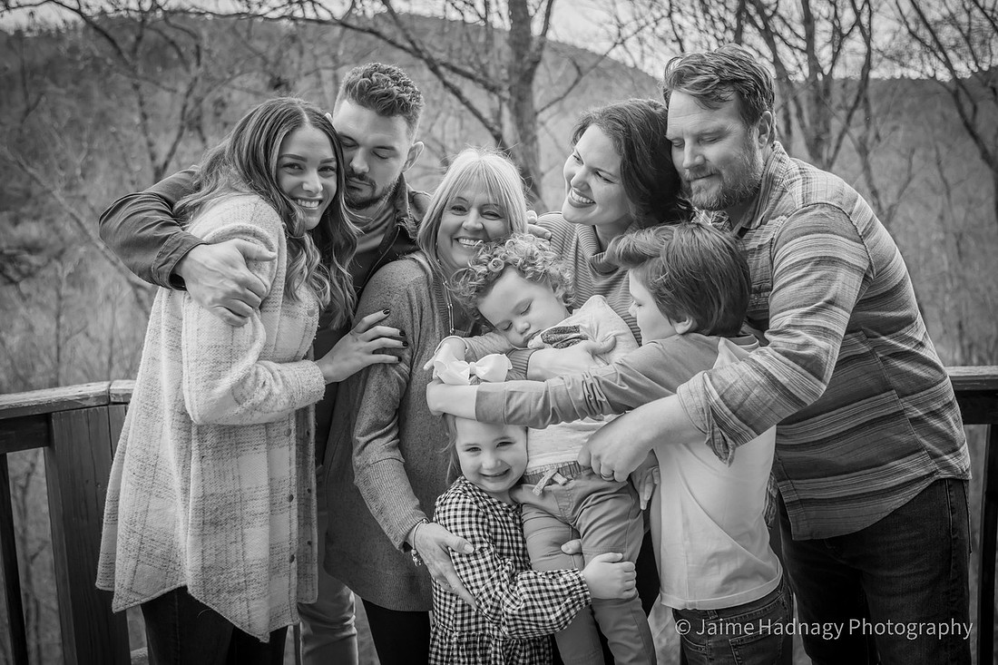 Family photos at cabin with sleeping boy | Black Mountain Photographer