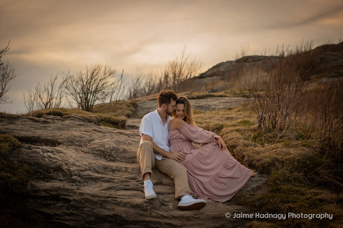Beautiful Couple Snuggling on a Mountain