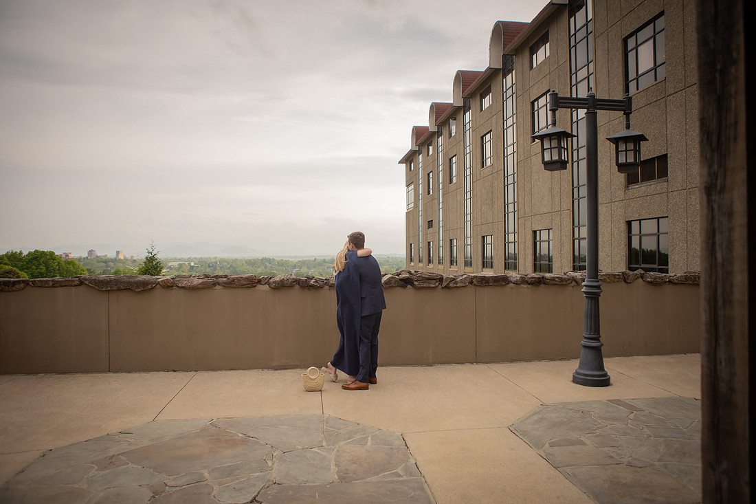 Proposal at Omni Grove Park Inn Vanderbilt Terrace with view of Asheville Downtown | Engagement Photography