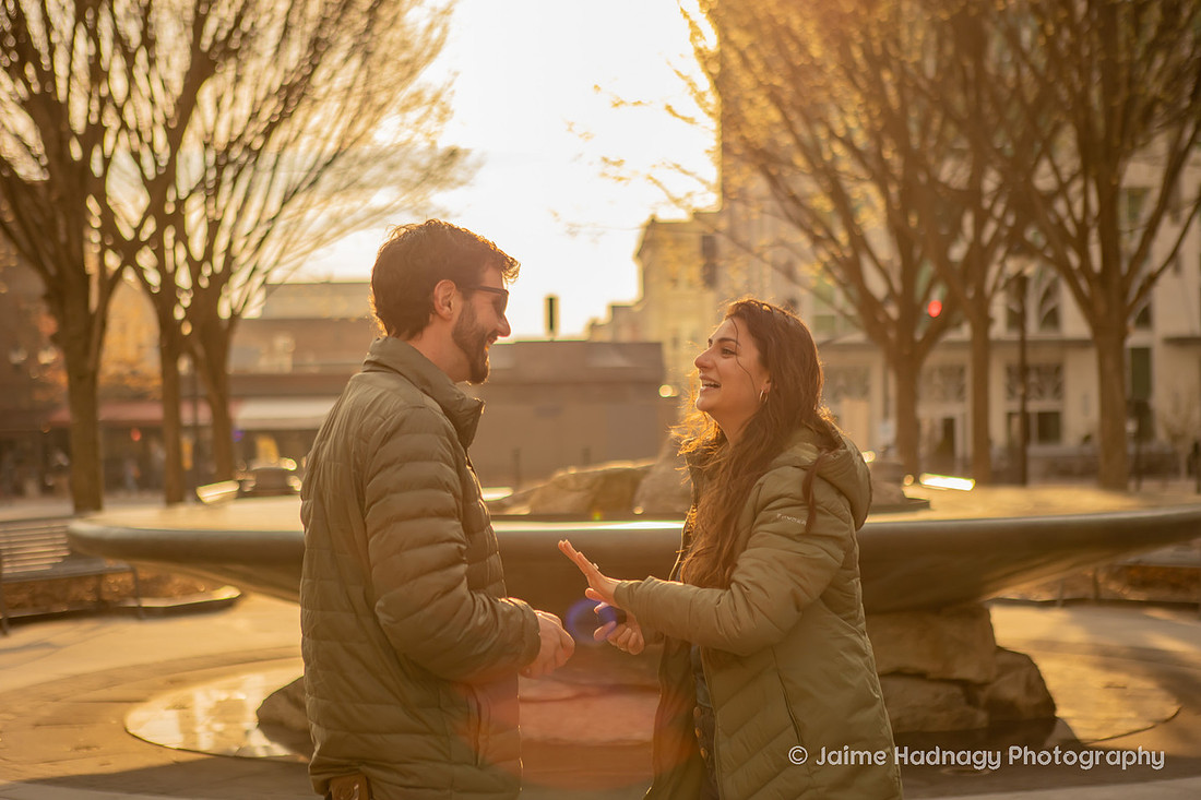 Surprise Proposal in Downtown Asheville by the Fountain | Engagement Photographer