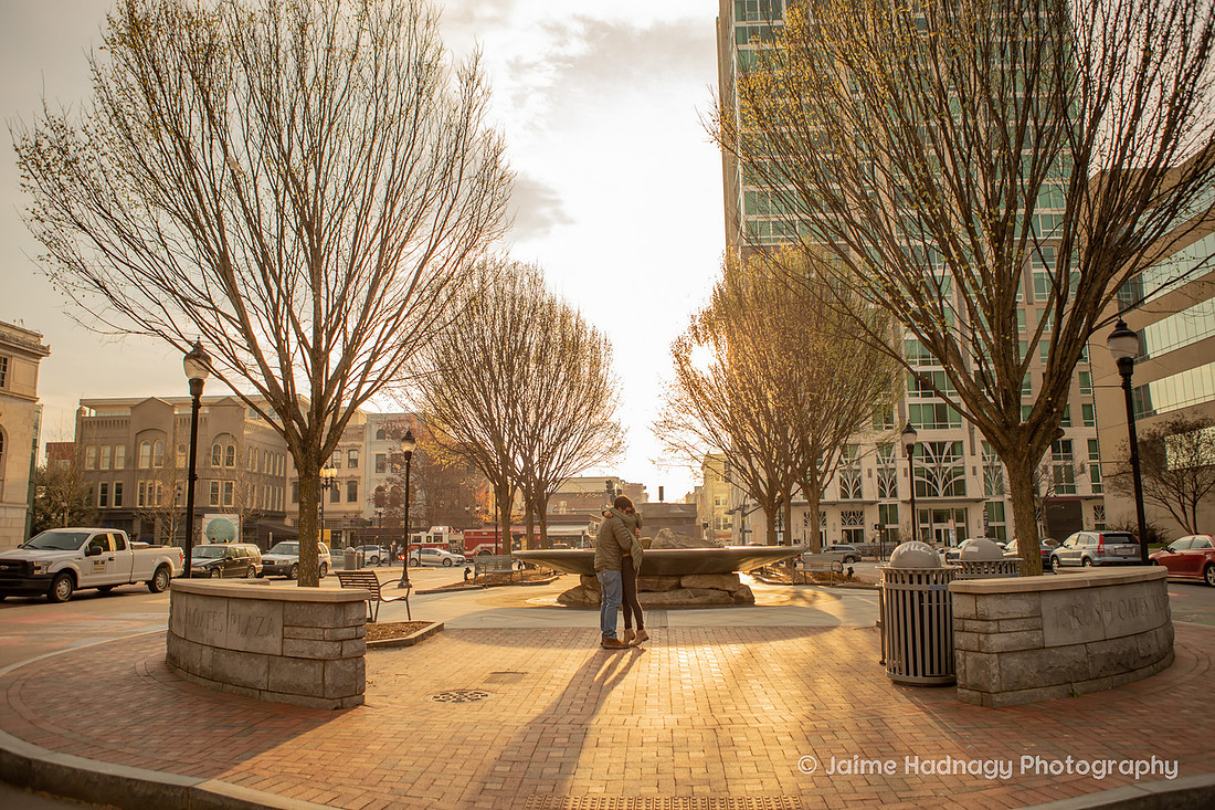Surprise Proposal in Downtown Asheville by the Fountain | Engagement Photographer