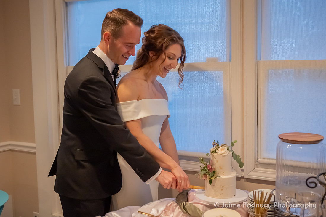 Bride and Groom Cutting Cake | Asheville wedding photographer