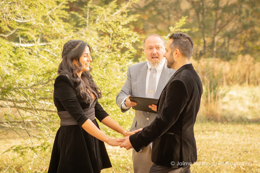 Bride and Groom Wearing Black at Wedding