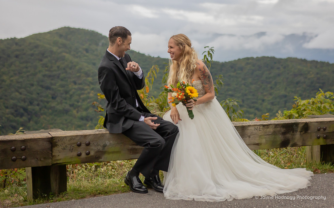 Happy Bride and Groom Laughing on Blue Ridge Parkway | Asheville Elopement
