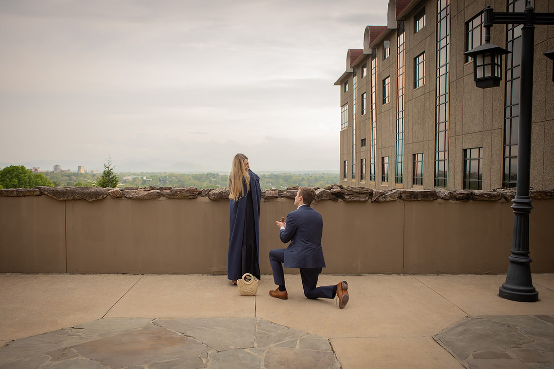 Proposal at Omni Grove Park Inn Vanderbilt Terrace with view of Asheville Downtown | Engagement Photography