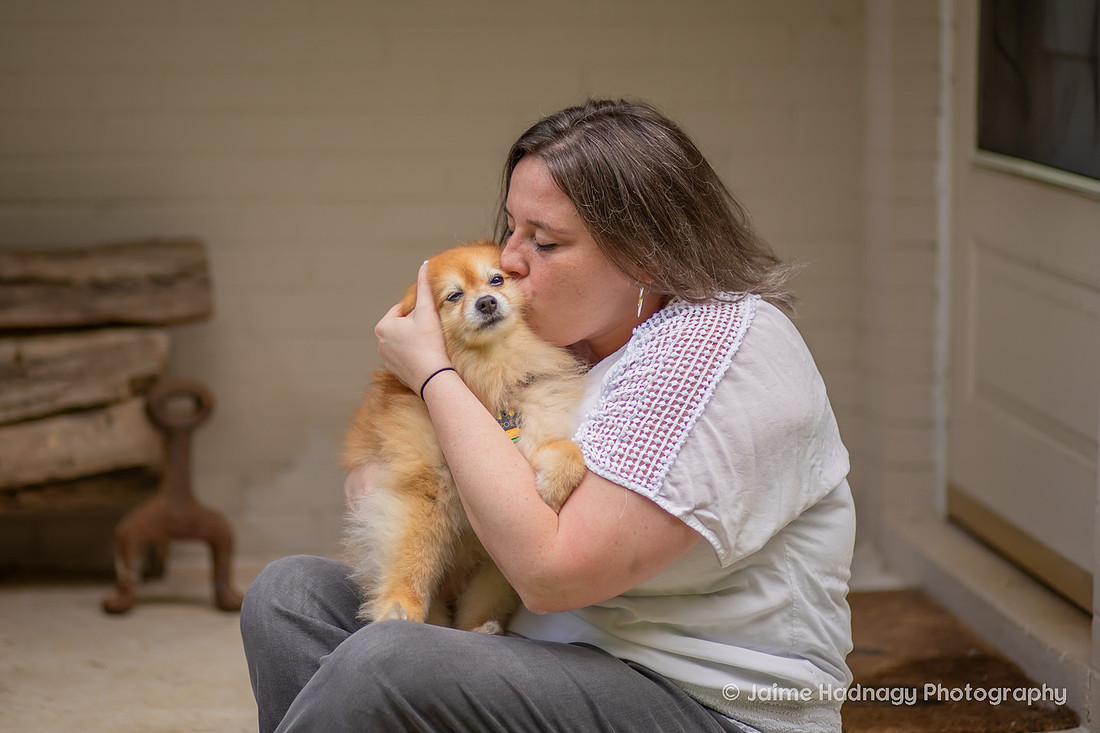 At home photoshoot of woman and her dog | asheville pet photographer