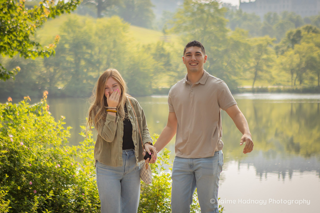 Man Proposing to girlfriend at Biltmore Estate Lagoon | Asheville Engagement Photographer