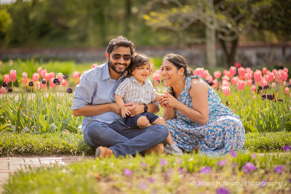 Family Playing with Baby n Tulip Garden