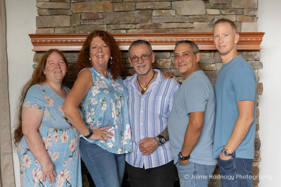Family Photos in Front of Fireplace