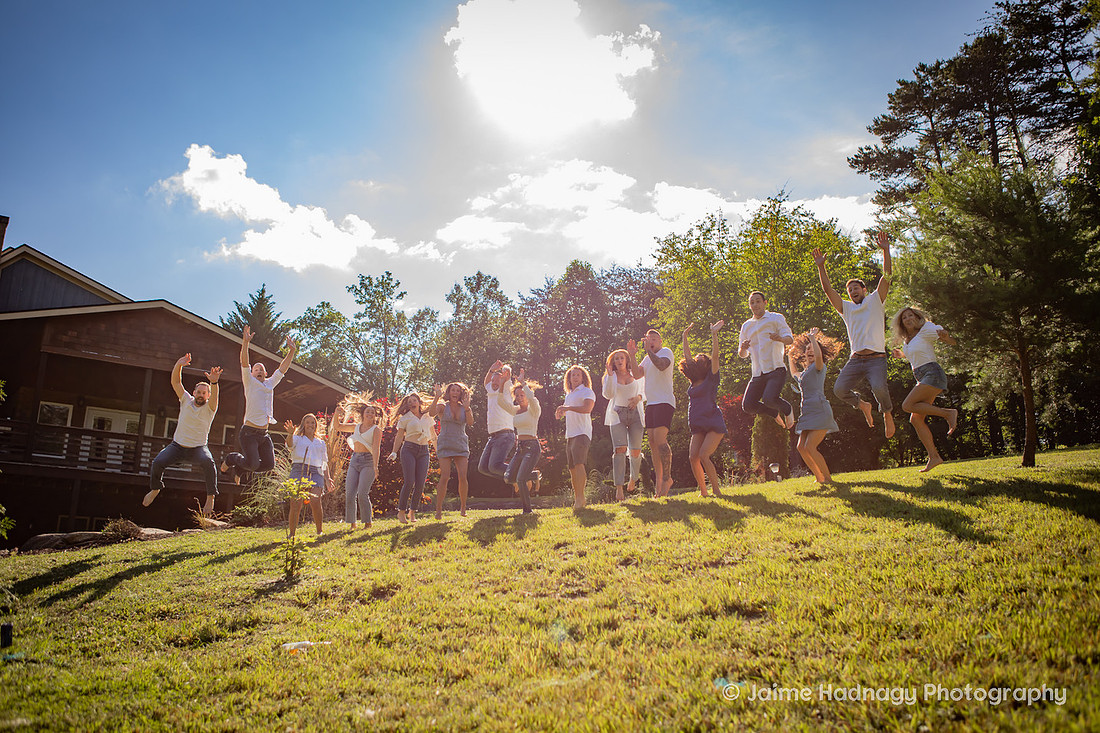 Extended Family Jumping in the Air | Asheville Photographer