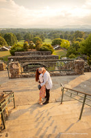 couple hugging after a surprise proposal during sunset time