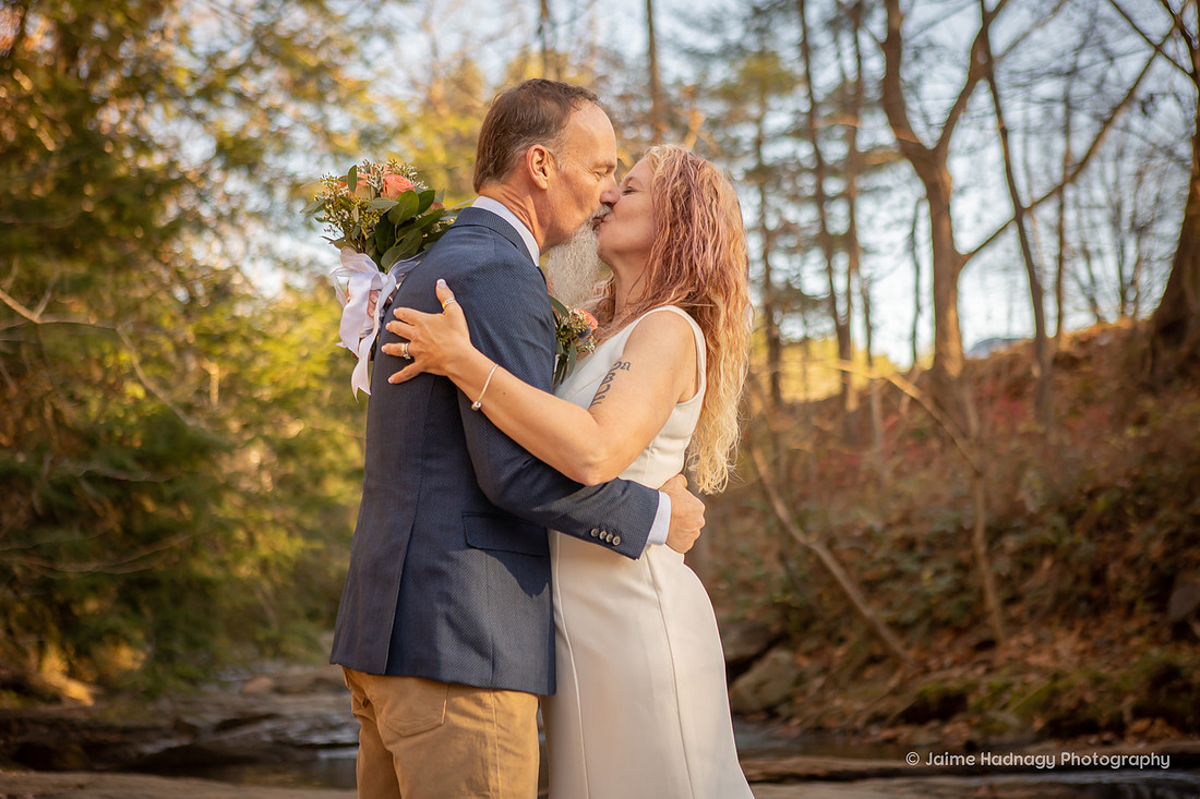 First Kiss Elopement on River | Asheville Wedding Photography