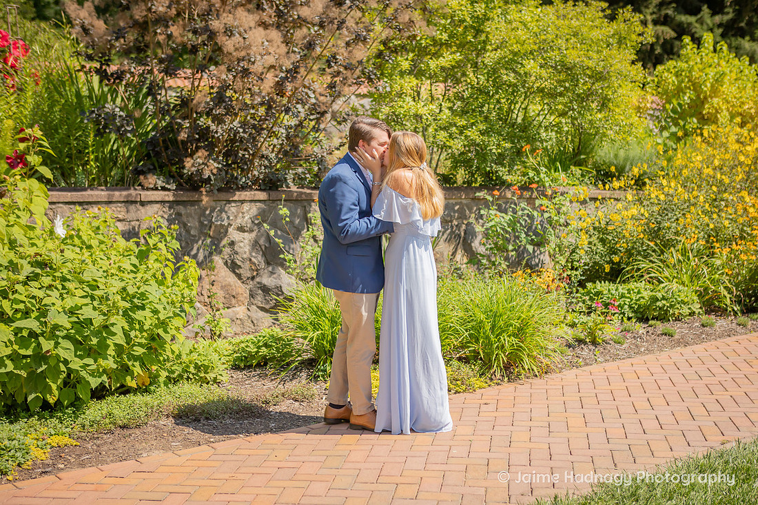 Surprise Proposal in the Walled Gardens of Biltmore Estate | Asheville Engagement Photographer