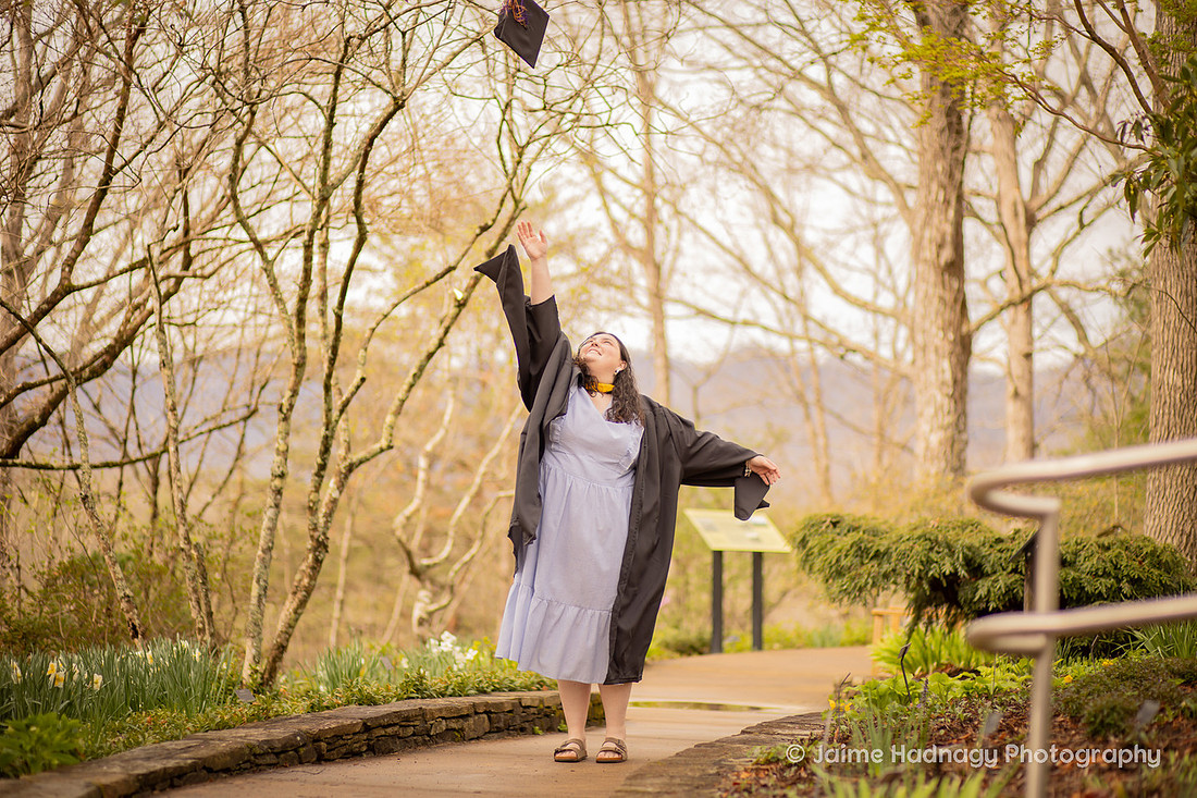 Graduation Portrait Student Tossing Cap