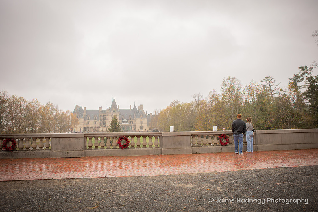 Surprise Proposal at the Biltmore Estate on a rainy day | Asheville Engagement Photographer