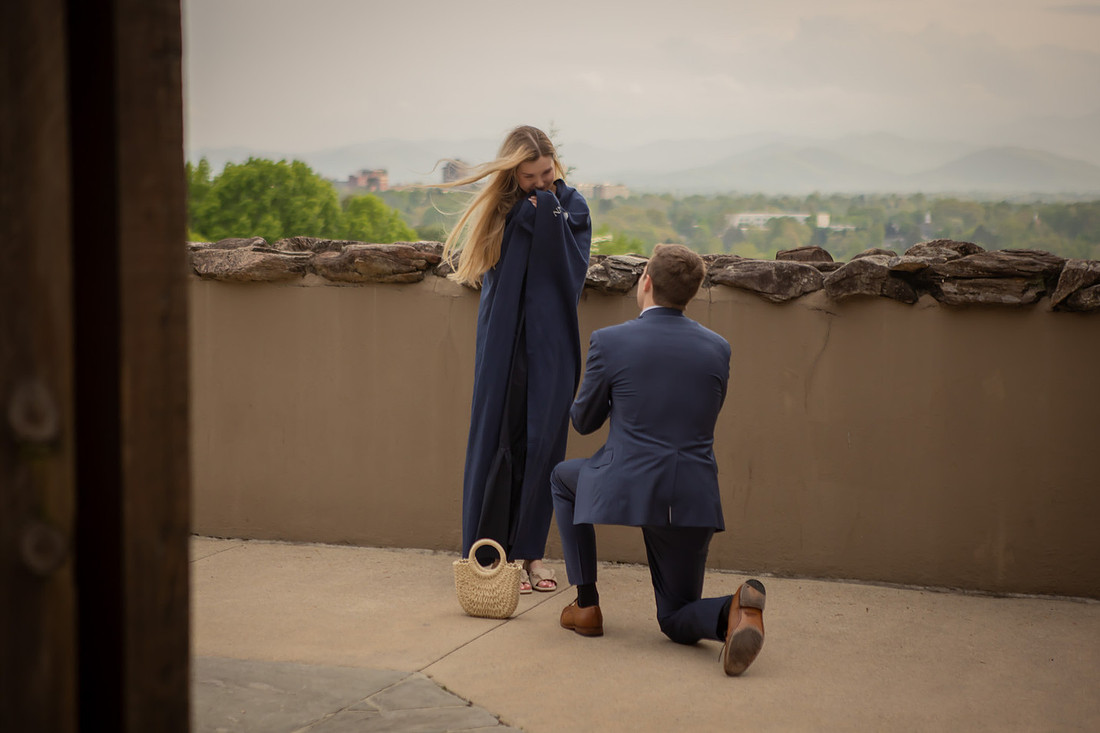 Proposal at Omni Grove Park Inn Vanderbilt Terrace with view of Asheville Downtown | Engagement Photography