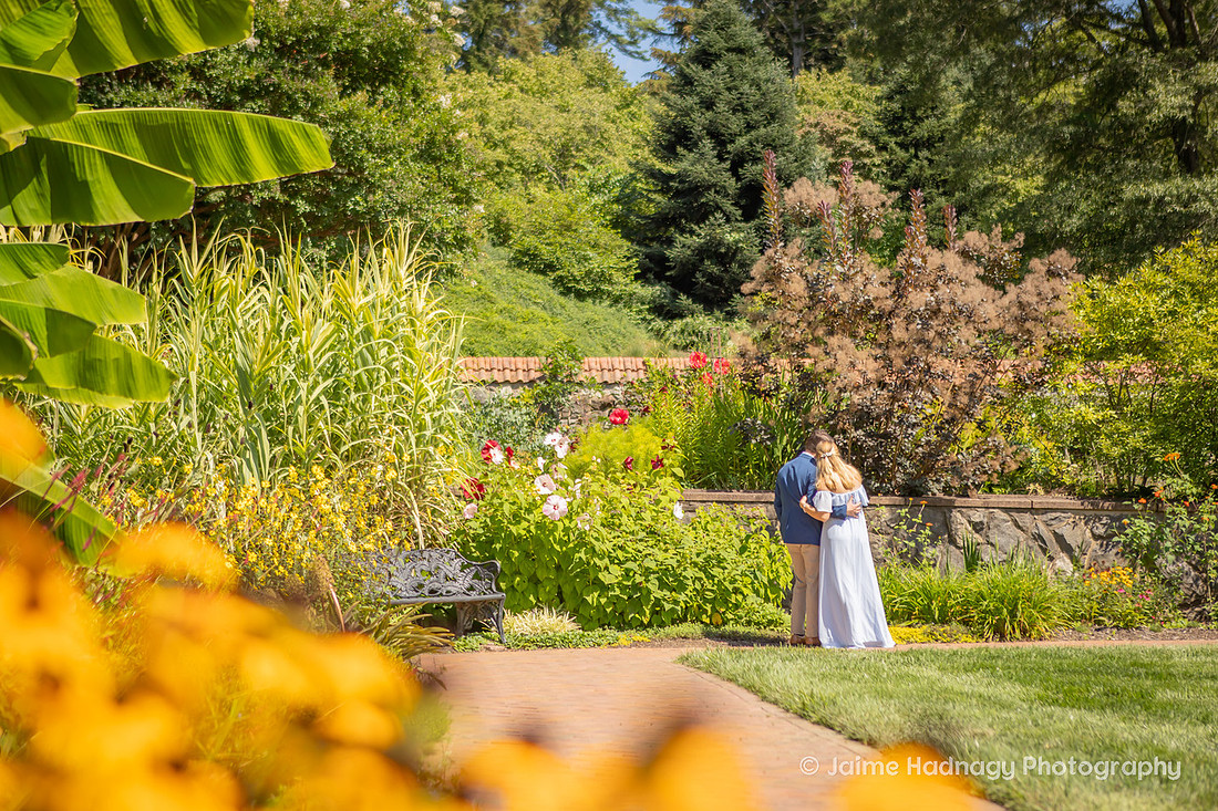 Surprise Proposal in the Walled Gardens of Biltmore Estate | Asheville Engagement Photographer