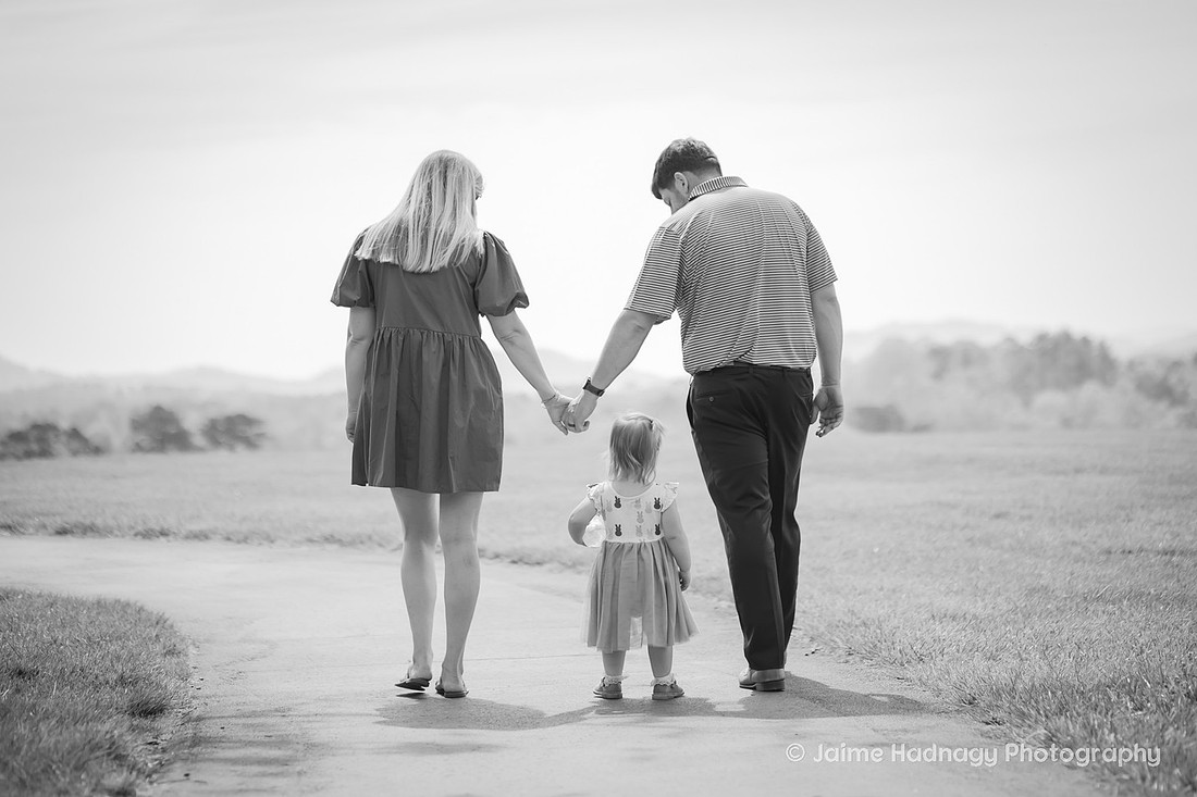 Family of three with toddler black and white photo