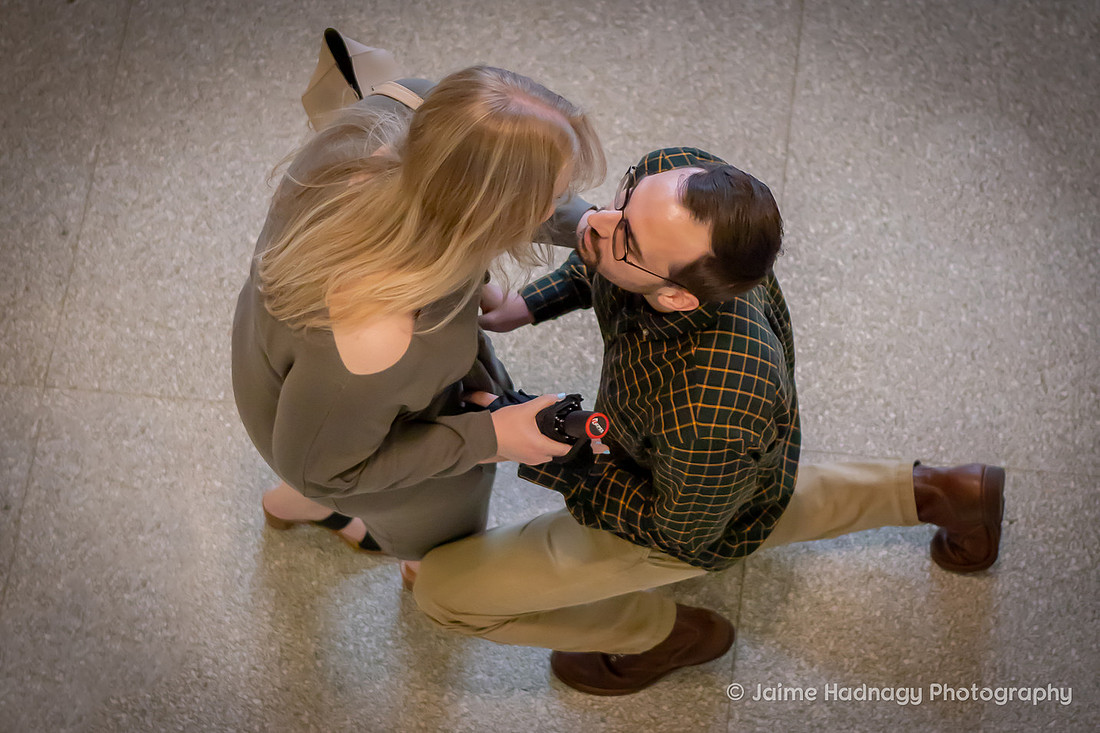 Surprise Proposal Asheville Grove Arcade | Engagement Photo