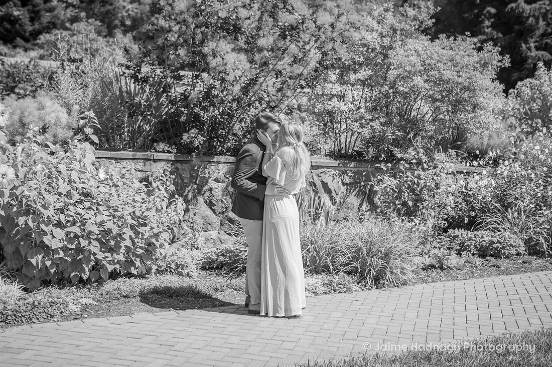 Surprise Proposal in the Walled Gardens of Biltmore Estate | Asheville Engagement Photographer